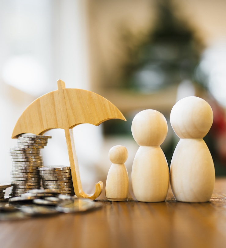Umbrella Icon And Family Model, Security Protection And Health Insurance. The Concept Of Family Home, Protection, Health Care Day, Car Insurance.