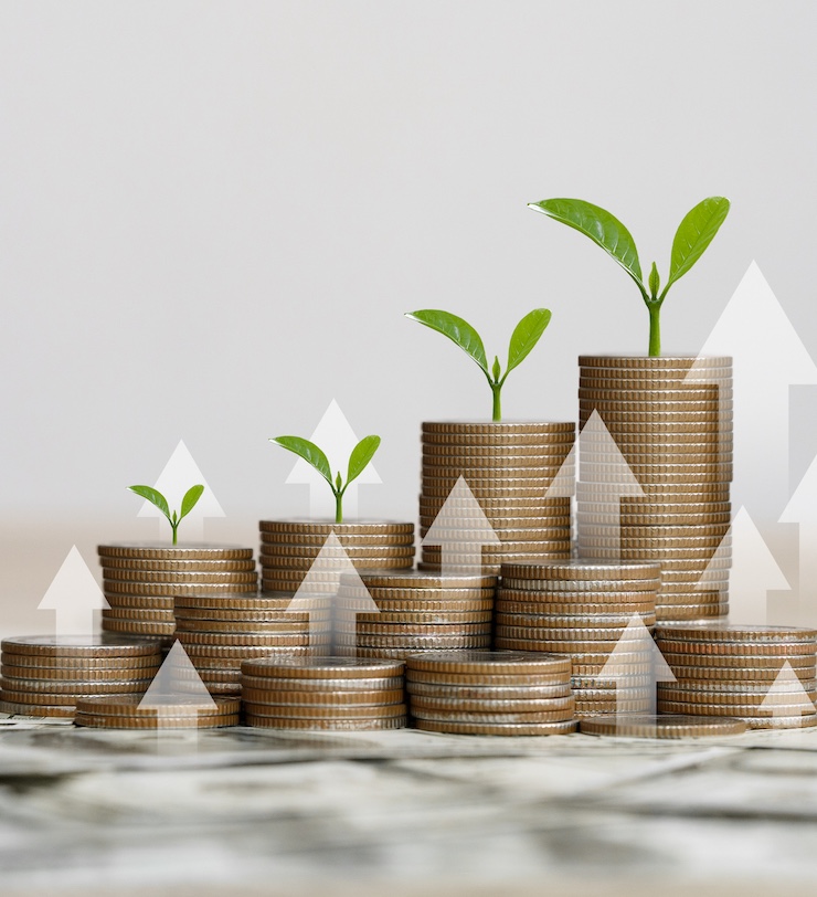 Stack Of Silver Coins With The Chart In Passive Income Financial Concept And Financial Investment Business Stock Growth. Finance Freedom Concept.